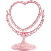 Our Cottagecore Vintage Style Heart Shaped Mirror is Intricately crafted with ornate floral and scrollwork detailing, giving the perfect, timeless cottagecore aesthetic. The silhouette adds a romantic touch to any vanity, bedroom, or entryway. 