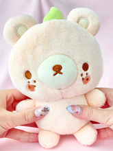 Meet the Fujibee Peach Bear Boutique Plushie, a special boutique quality stuffed animal and a lovely friend with a love for life's simple pleasures. 
Fujibee’s simple but pleasant design fulfills all your kawaii needs, with its understated cuteness and chic shape. Comes in several colors for a truly collectible experience!