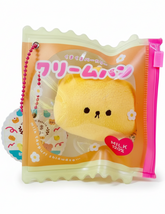 Say hello to the cutest little snack to carry your essentials! This unique Kuma Bakery Bear in a Bag Keychain, Milk Bread features a soft, squishy bread bear plushie tucked inside a charming clear and multi color mini wallet. The softness is like a mochi dessert and the design is unmatched.