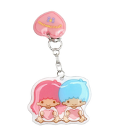 Add a sprinkle of celestial charm to your belongings with the Little Twin Stars Retro Puff Keychain. Featuring the beloved duo, Kiki and Lala, this adorable keychain brings a touch of magic and whimsy wherever you go. Perfect for keys, bags, or backpacks, it's a delightful accessory for any Sanrio fan.