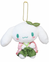 Suppose you miss the beauty of spring and the lovely fragrance of cherry blossoms. Have it forever with the Matcha Sakura Garden Kimono Cinnamoroll Plush Keychain, an enchanting mix of traditional Japanese elegance and kawaii charm.
Cinnamoroll's gentle expression and detailed kimono design make his charm as lovely as the spring flower. The vibrant green color and delicate sakura motifs give him a unique and charming look. This plush keychain also reflects the cultural significance of cherry blossoms