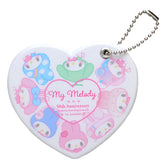 Celebrate My Melody's 50th Anniversary in style with our exclusive Girly Pop Heart-shaped Slide Mirror! This special commemorative piece combines functionality with kawaii charm, featuring our beloved bunny friend in a perfectly pink heart design. The clever sliding mirror mechanism keeps the reflective surface protected while showcasing My Melody's adorable anniversary artwork. Perfect for quick touch-ups on the go, this compact mirror brings together 50 years of cuteness with practical everyday use!