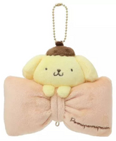 Classic Sanrio characters are featured as their adorable selves, plush style, at the center of a cutie pie bow. The embroidered character name elevates this Big Bow Pompompurin Plush Keychain
