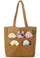 Carry the charm of the forest close with this adorable Sanrio Woodland Creature Handbag, crafted from soft brown corduroy fabric. This delightful accessory brings together cozy textures and whimsical design, perfect for adding a touch of nature-inspired style to your everyday look. Featuring CInnamoroll, Hello Kitty, My Melody, Pompompurin, and Pochacco in a playful woodland creature motif, the handbag showcases beloved Sanrio characters, each with its own unique personality.