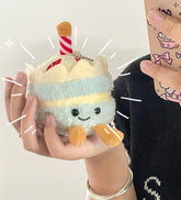 Celebrate every day like it’s your birthday- or gift it to your favorite people on their actual birthday!- with the Strawberry Kawaii Birthday Cake Plush Keychain! This charming accessory brings the joy of cake everywhere you go, combining sweetness and functionality into one adorable design. It features a plush, pastel-layered birthday cake topped with a cute strawberry and playful sprinkles.
It makes a fun and thoughtful present for birthdays, kawaii lovers, or anyone who enjoys sweet, playful accessorie