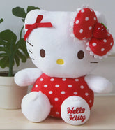 Our Strawberry Red Polka Dots Hello Kitty Plushie adds a sweet splash of strawberry charm to your Sanrio collection! This adorable plush features Hello Kitty in a delightful red polka dot design, perfectly complemented by her special red bow with white polka dots and a charming strawberry accent in the center. "Hello Kitty" is embroidered on the foot, adding a classy personalized touch.