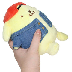 Jump back to the golden age of kawaii with our 90s Style Throwback Retro Pompompurin Plushie! This nostalgic version of Sanrio's beloved golden retriever pup captures all the vintage vibes while keeping his signature charm. Featuring Pompompurin in a retro-inspired outfit- a red backwards baseball hat and jean jacket, this plushie perfectly embodies the sweet spirit of 90s kawaii culture. Whether you're a long-time fan or new to collecting, this huggable piece of nostalgia brings together the best .