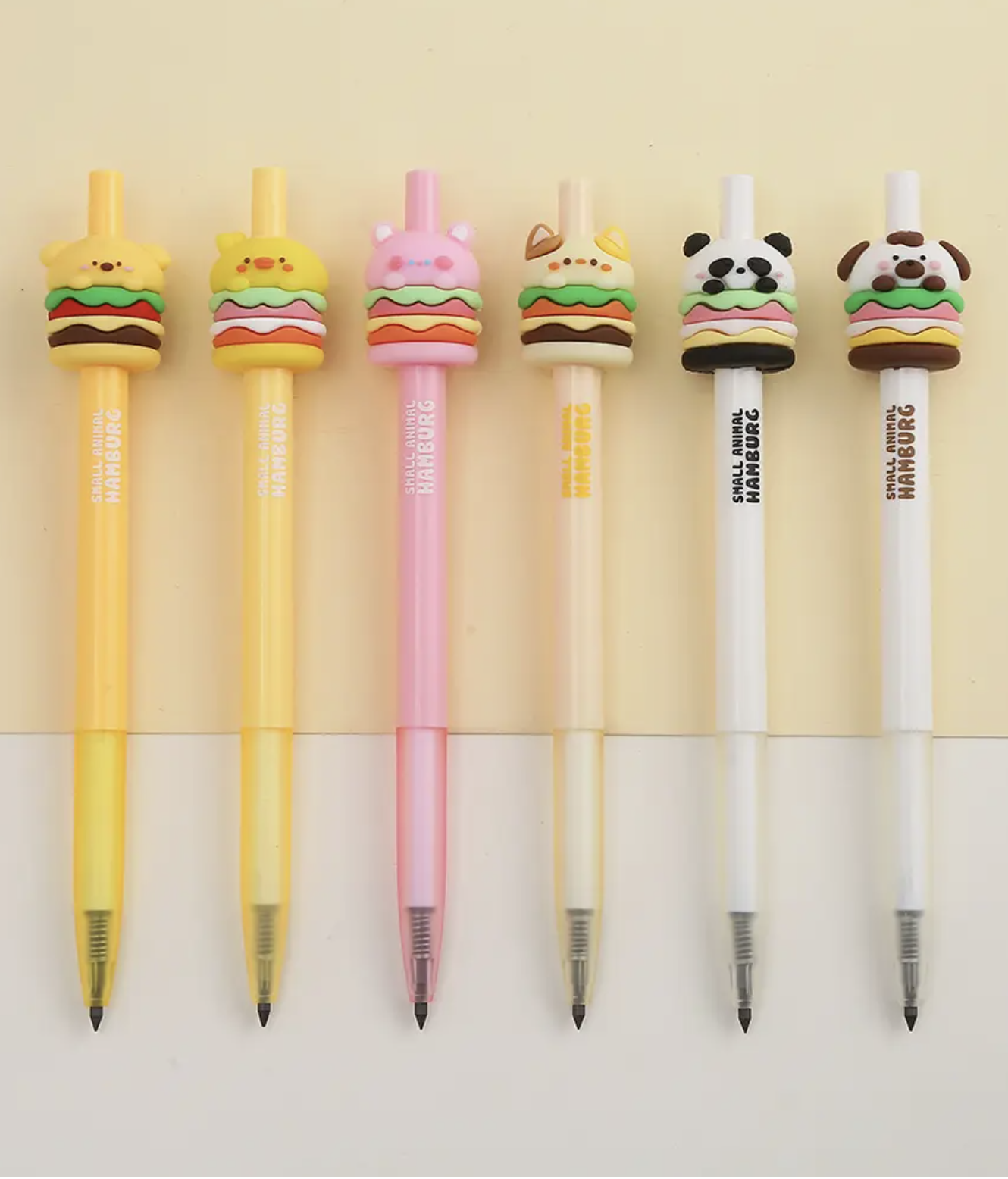 These amazingly cute Animal Burger Kawaii Fine Tip Gel Pens use a thick, opaque gel-based ink, combining the permanence of oil-based ballpoint ink with the smooth glide of water-based ink. A gel pen is the best solution when writing or illustrating on dark or slick surfaces, and having an ultra friendly lil burger buddy to keep you company while you work is always a great idea