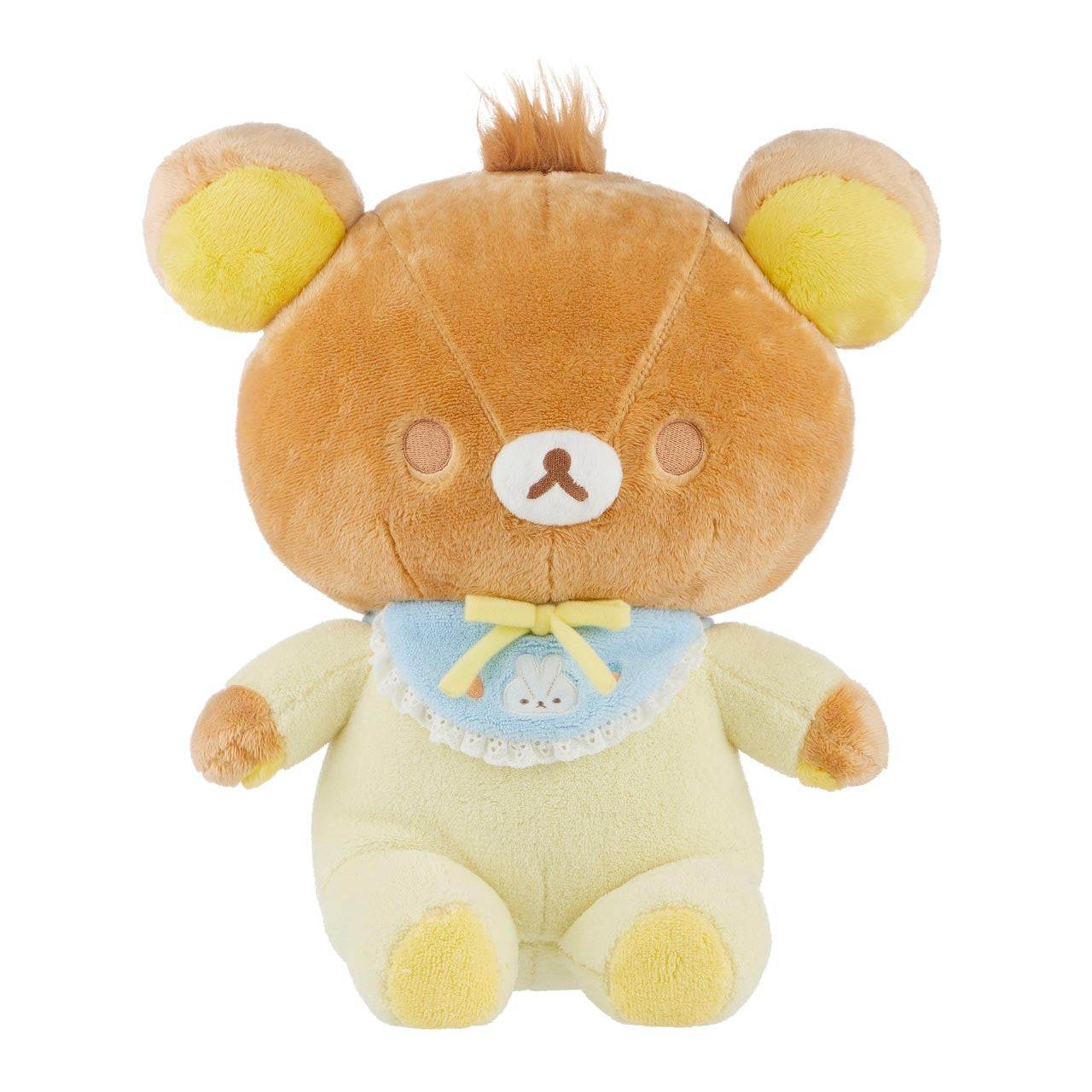 As if Rilakkuma didn't already capture all of our hearts, we now get to cuddle up with this ultra-soft and adorable Big Baby Rilakkuma Pajama Onesie Plushie! This plush toy features Rilakkuma dressed in a cozy, pastel yellow pajama onesie, complete with a cute blue bib with an embroidered bunny on it, perfect for nap time and hugs.&nbsp;