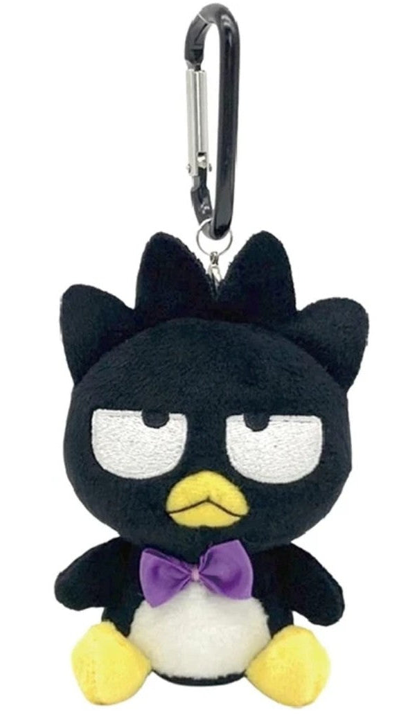 Meet the Bad Badtz Maru Purple Bow Tie Carabiner Plush Keychain with zero patience and a whole lot of style! This keychain features Badtz Maru in his best attire. An unimpressed expression, fancy purple bow tie, tiny yellow beak, and signature grumpy gaze, he looks like he’s judging everyone in the room—but underneath that bad attitude is a lovable little companion who’s always ready to stick by your side.