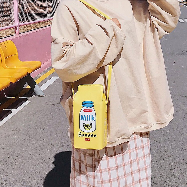 Sweeten your style with the Banana Milk Carton Kawaii Street Style Shoulder Bag playful and trendy accessory inspired by kawaii streetwear culture. Its unique milk carton shape and charming design make it the perfect statement piece for everyday wear or special outings.
