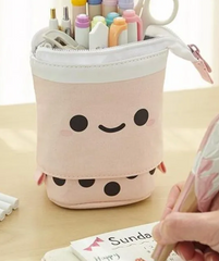 The Boba Tea Kawaii Style Pencil Cases also demonstrate a unique feature, where the top part of the "cup" pulls down to display more of the items inside. An attached loop and zip closure make it portable as ever. Use it for other items, too, like glasses and make-up- korean style, kawaii