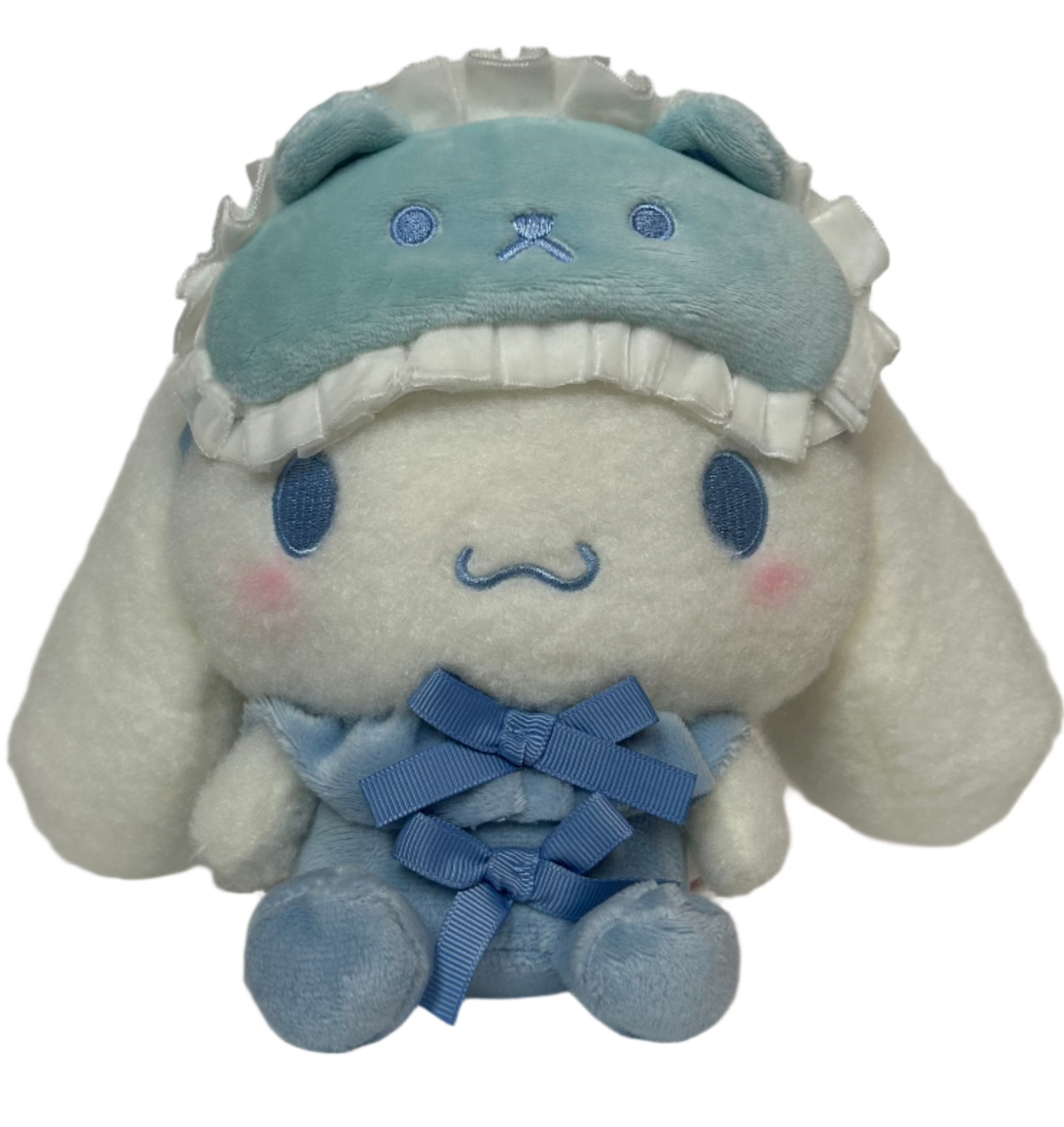 Sanrio's friendly favorite, Cinnamoroll, is stylishly ready for bed! The Bow Pajamas + Mascot Sleep Mask Cinnamoroll Plushie features two center bows and an attached bear-shaped sleep mask. Soft fabrics make this huggable plush perfect for nighttime snuggles.