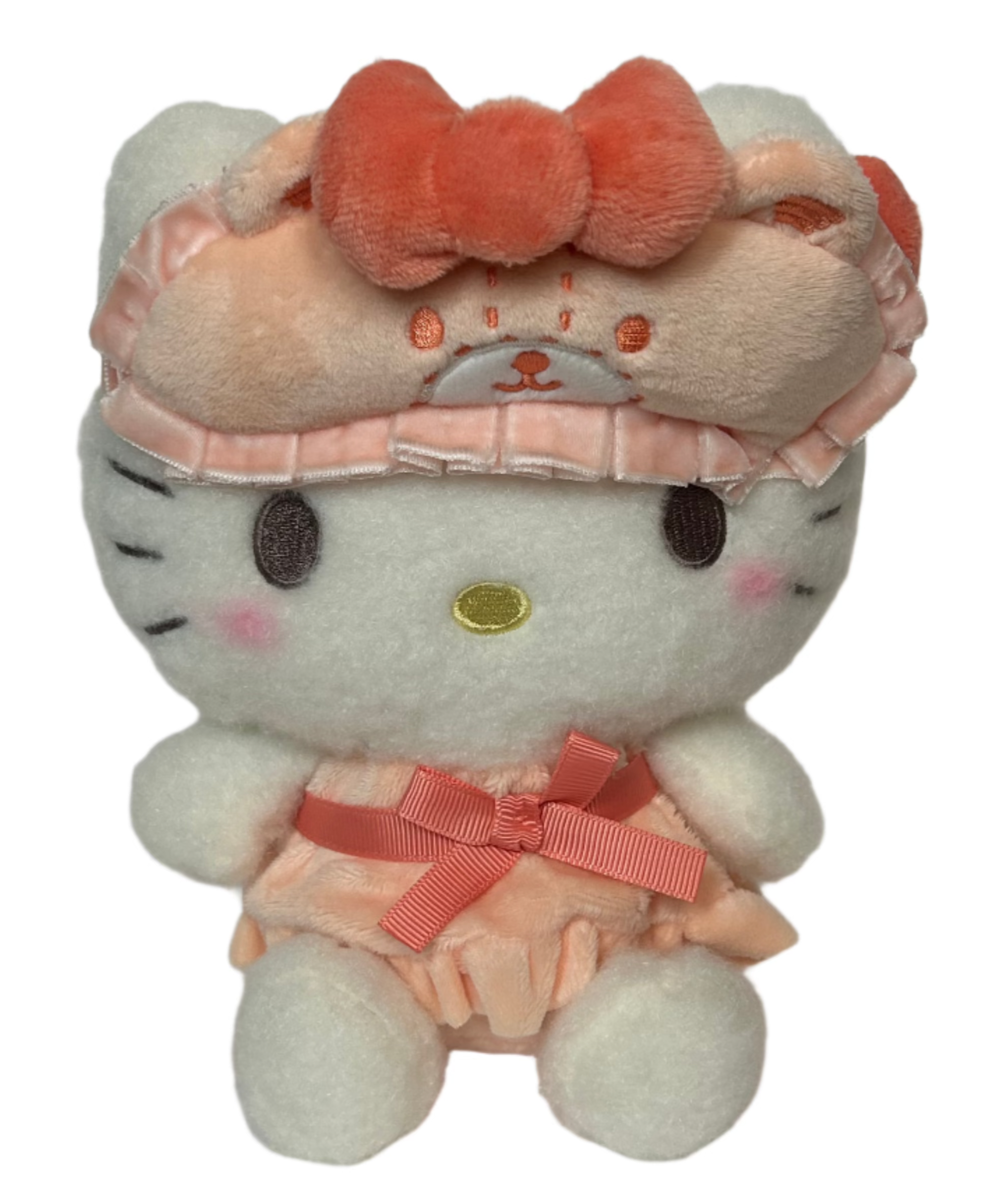 Sanrio's classic favorite, Hello Kitty, is stylishly ready for bed! The Bow Pajamas + Mascot Sleep Mask Hello Kitty Plushie features a center bow on both top and bottom, ruffled nightie, and an attached bear-shaped sleep mask. Soft fabrics make this huggable plush perfect for nighttime snuggles.