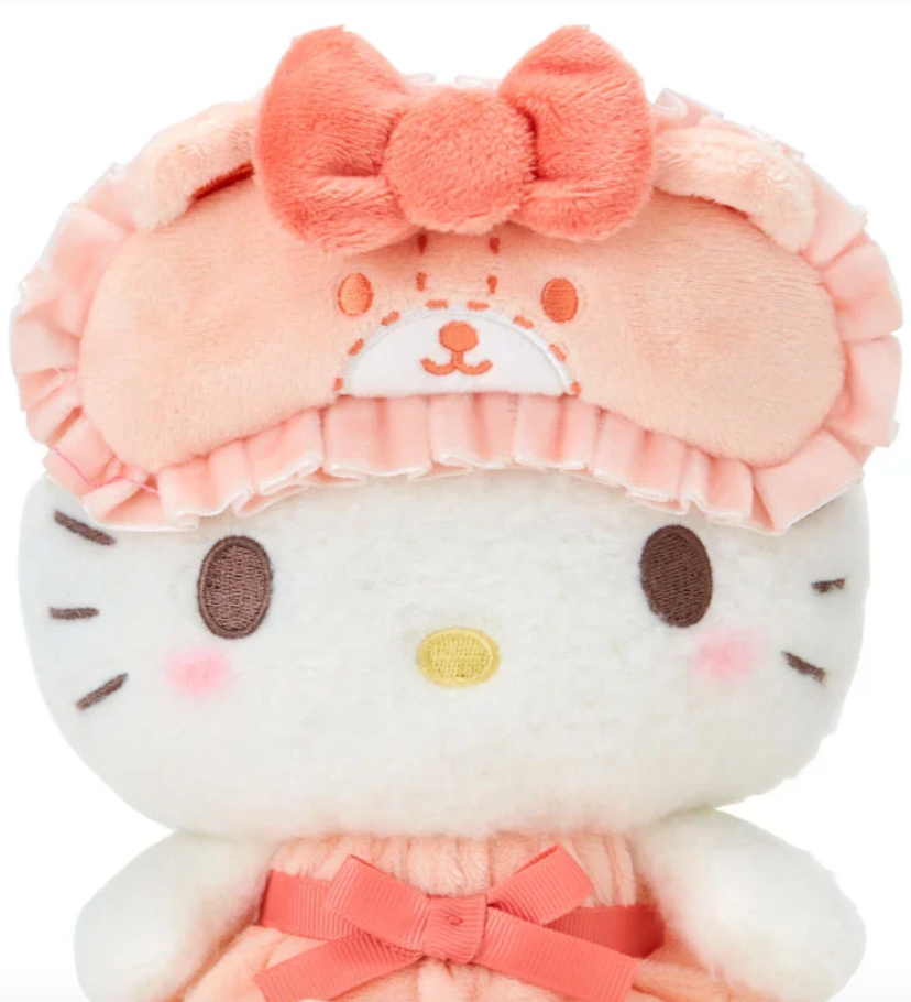 Sanrio's classic favorite, Hello Kitty, is stylishly ready for bed! The Bow Pajamas + Mascot Sleep Mask Hello Kitty Plushie features a center bow on both top and bottom, ruffled nightie, and an attached bear-shaped sleep mask. Soft fabrics make this huggable plush perfect for nighttime snuggles.



A comforting friend perfect for winding down. A nice pairing if you're assembling a spa-day gift basket. A solid addition to any plushie or Hello Kitty collection. Relax with the calming colors, friendly, embroid