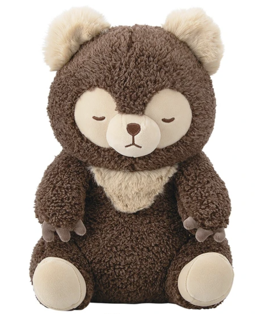 So fluffy, soft and fuzzy, inspiring peace and contentment, this Brown Bear Plushie with Hidden Zip Pouch is great for hugging, lying down on, and even holding a few items in its back zip pouch.