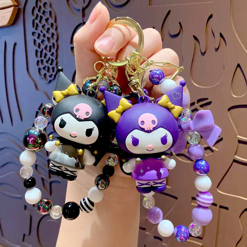 Each bracelet keychain is pieced with coordinating beads that complement Kuromi’s playful personality, offering a stylish way to keep your keys or decorate your bag. The stretchy bracelet design allows you to wear it comfortably on your wrist and the keyring lets you attach it to your favorite bags and accessories.