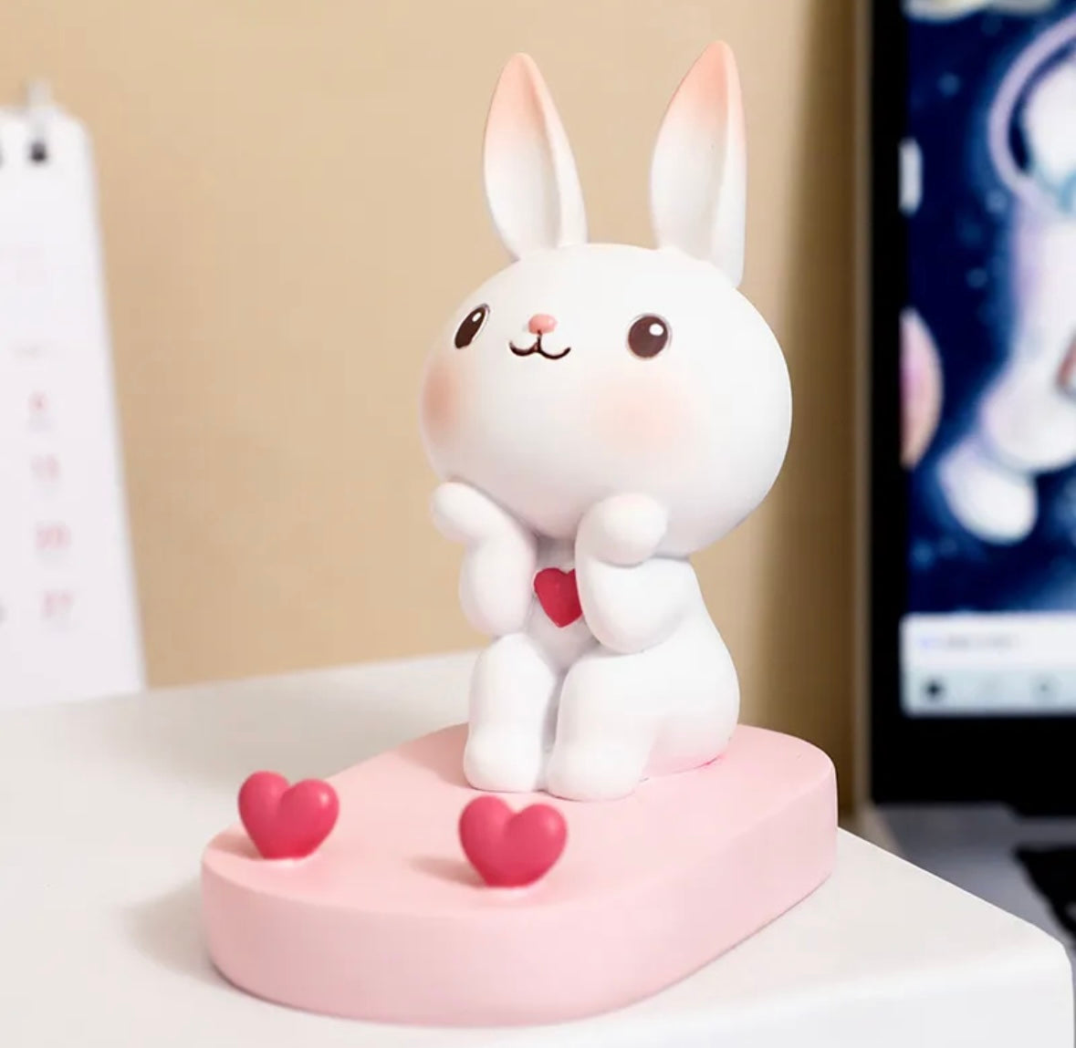 This charming holder showcases an adorable bunny with a cheerful expression, making it a delightful addition to your bedside table or desk for effortless calls and enjoyable music sessions, so kawaii!