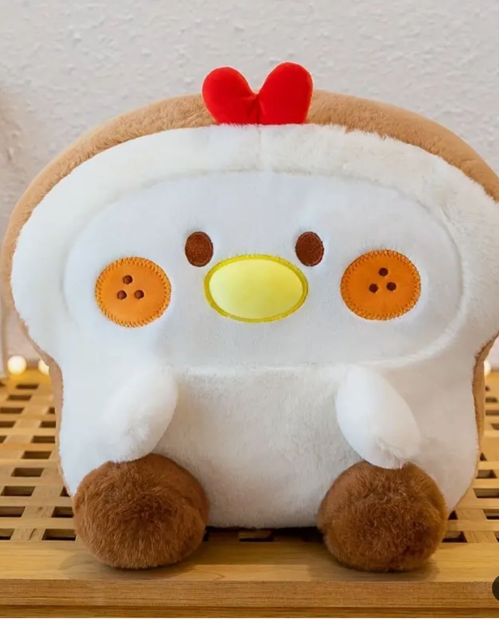 This adorable Chicken Little Lovable Loaf Plushie is irresistibly cute, a delightful fusion that will charm you into an endless caboodle of toasty cuddles! 