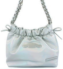 Class and shine meets everyday style with our Cinnamoroll Silver Metallic Ribbon Shoulder Bag! This limited edition bag features a stunning silver metallic finish adorned with elegant ribbon details and adorable Cinnamoroll charm. The practical drawstring cinch closure keeps your belongings secure while maintaining easy access. Perfectly sized for daily essentials and featuring a comfortable shoulder strap, this bag combines functionality with kawaii flair. 