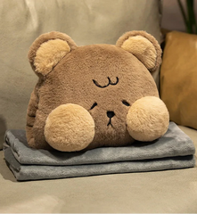 Cushion cozies are perfect for chilly days! This multifunctional plushie combines the softness of a huggable pillow with the coziness of a built-in hand warmer, all in an adorable cat design.&nbsp;

Shaped like a charming brown bear with sweet embroidered details, it’s perfect for cat lovers of all ages. High quality and well constructed to keep its shape for a long time, you can also tuck your hands into the hidden pocket for instant warmth and cozy relaxation.