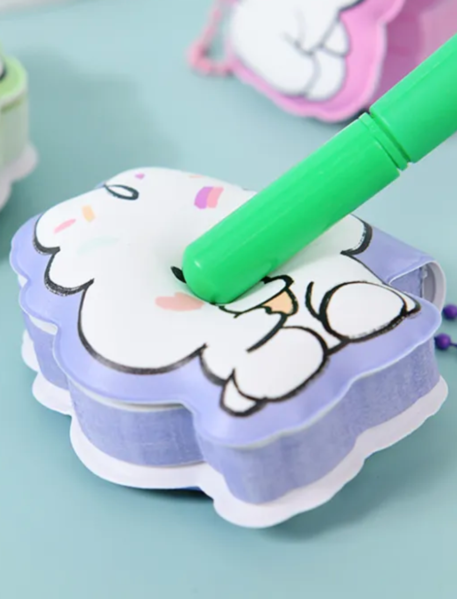 Bounce into this Doodle Bunny Mini Puffy Notebook—it's so cute and puffy! Its exterior features adorable illustrations of doodled bunnies with sweet rosy heart-shaped cheeks. They are available in four colors: pink, green, blue, and purple, and can be purchased in a full set of four!