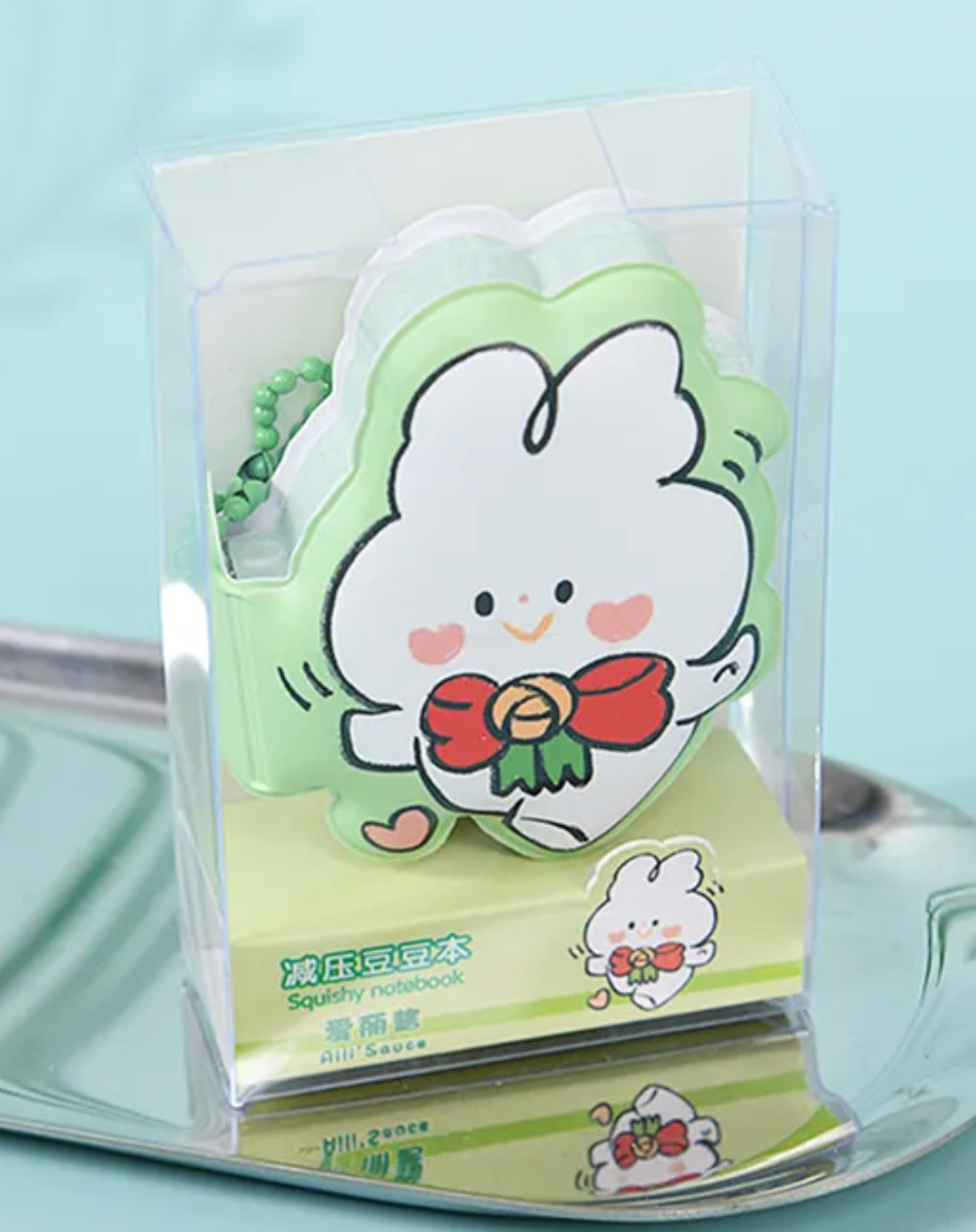 Bounce into this Doodle Bunny Mini Puffy Notebook—it's so cute and puffy! Its exterior features adorable illustrations of doodled bunnies with sweet rosy heart-shaped cheeks. They are available in four colors: pink, green, blue, and purple, and can be purchased in a full set of four!