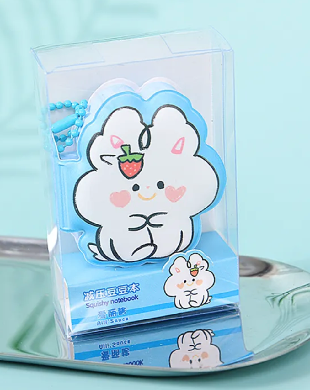 Bounce into this Doodle Bunny Mini Puffy Notebook—it's so cute and puffy! Its exterior features adorable illustrations of doodled bunnies with sweet rosy heart-shaped cheeks. They are available in four colors: pink, green, blue, and purple, and can be purchased in a full set of four!