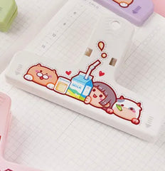 Study with the convenience of this adorable Farm Girl All Purpose Clip adorned with images sure to make you smile! This animated clip brings a touch of child-like charm to your kitchen, desk, or planner, making it a delightful accessory for organizing your notes and document or keeping your precious snacks fresh.