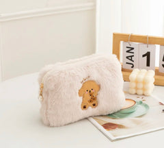 Perfectly sized for all your beauty essentials, these cosmetic bags are cute and functional, with a roomy interior and secure pearl-charmed zipper closure to keep your items organized and accessible.