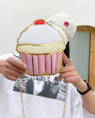 This delightful accessory is perfect for adding a playful yet chic touch to your outfit. Designed to resemble a frosted cupcake with shimmering gold detail, it’s a statement piece for anyone who loves kawaii style with a dash of glamour.

The Frosted Cupcake Gold Kawaii Street Style Purse features a rounded cupcake shape, complete with a fluffy pastel "frosting" top, a red cherry topping, and a metallic gold base that gleams in the light.