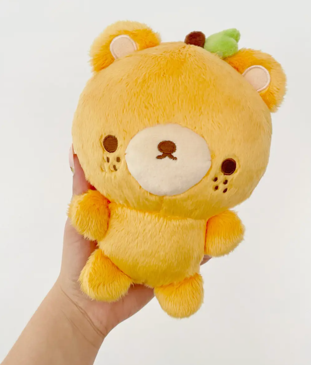 This cuddly boutique designed bear features exquisite embroidered details, capturing the essence of autumn with his adorable pumpkin-themed design. Made from soft, huggable materials, he’s perfect for snuggling up during the cozy fall season.