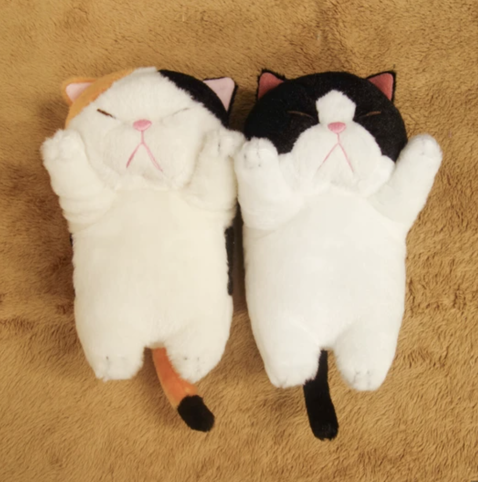 Celebrate the legendary cat face plant with this adorable plushie! The cutest of feline maneuvers is captured with this high quality plush. With a round head, squinty eyes, pink nose, tail between its hind legs, and stitching at the paws, this Funny 'Can't-Even' Face Plant Cat Plushie has it all.