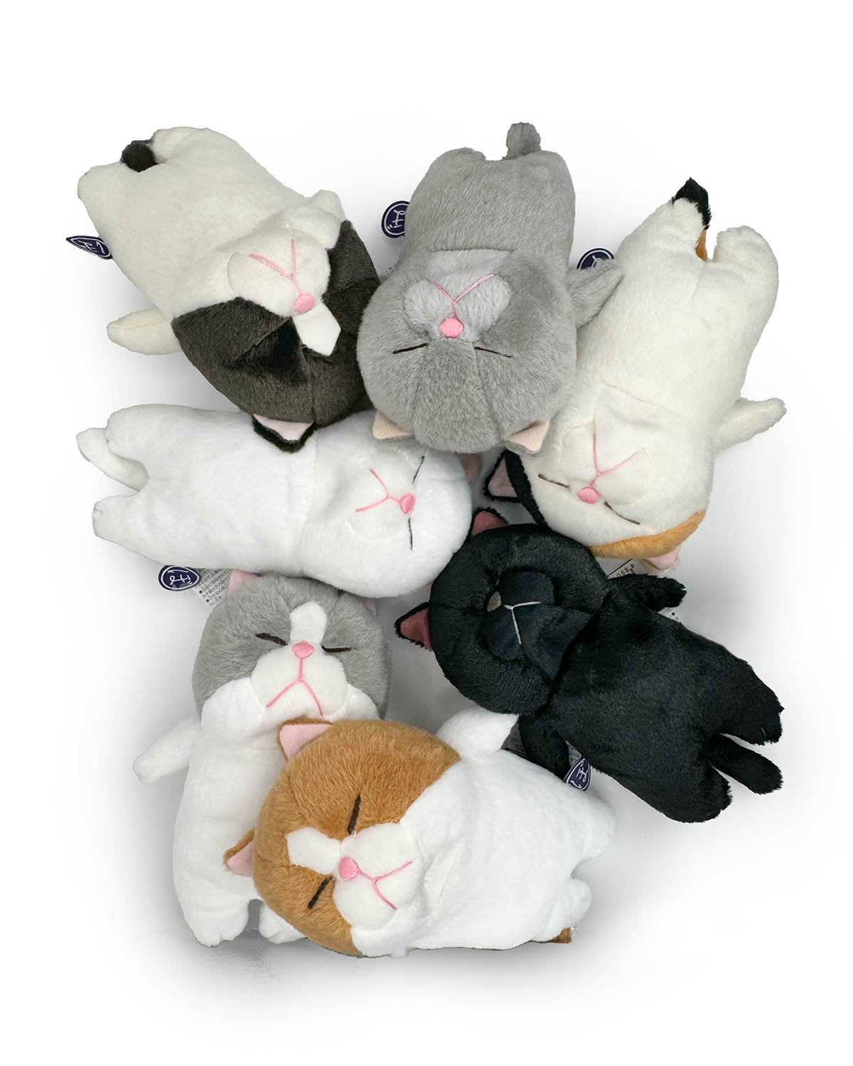 Funny Sleeping Cats Plushies, so cute you might end up knocked on your back like this when you see it in person. Soft and firm for great hugs. The kinda cute that remains charming with the passing of time. ^_^ Small beans in its back give it a perfect soothing weight.