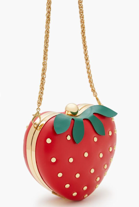 An amazing eye-catching fashion piece! Fall in love with this deliciously cute crossbody bag featuring a heart-shaped design that's perfect for kawaii fashion lovers! This charming accessory combines luxury and whimsy with its golden strawberry ball details and playful faux fur leaf accent.

Make every outfit pop with this unique blend of kawaii charm and elegant details! The gold chain adds a touch of sophistication while the playful strawberry balls and fuzzy green leaf keep it delightfully sweet. 