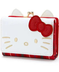 Plaid Print Wallet! Perfect for fans of the beloved Sanrio character, Hello Kitty, this wallet is as functional as it is cute.

Featuring Hello Kitty in a classy but fun red plaid design, the wallet is accented with a stylish gold clasp, giving it a chic, feminine look.

Made from durable synthetic leather, with multiple compartments for cards, cash, and coins.