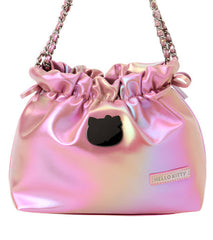 Class and shine meets everyday style with our Hello Kitty Pink Metallic Ribbon Shoulder Bag! This limited edition bag features a stunning silvery metallic finish that changes color at different angles, and is adorned with elegant ribbon details and an adorable Hello Kitty charm. The practical drawstring cinch closure keeps your belongings secure while maintaining easy access. Perfectly sized for daily essentials and featuring a comfortable shoulder strap, this bag combines functionality with kawaii flair. 
