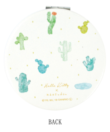 Elevate your beauty routine with the Hello Kitty Sanrio Boutique Collectible Compact Mirror! This charming mirror features the lovable queen Hello Kitty from Sanrio in a popular print by the Japanese boutique brand, Naosudou.

The compact mirror showcases a delightful design with Hello Kitty in a stylish watercolor desert and cactus print, adding a playful yet elegant flair. The high-quality mirror is perfect for on-the-go touch-ups and is housed in a durable, collectible case that’s as cute as it is practi