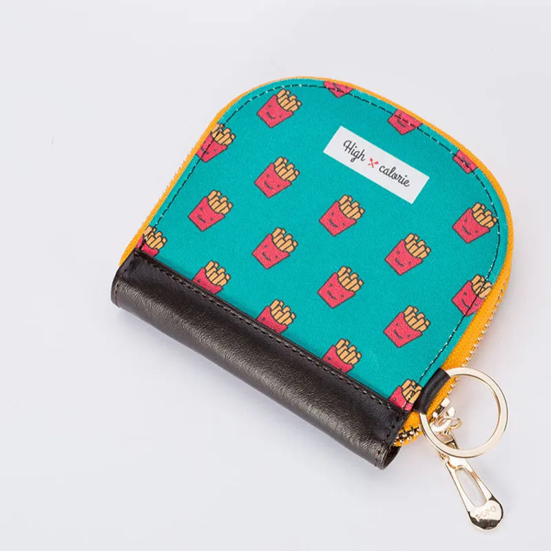 Need more money to buy snacks? Store your snack money in the adorable High Calorie Junk Food Zip Wallets. These charming wallets feature cute illustrations of your favorite treats, including a delightful cupcake, crispy fries, and a refreshing cola, Cute mini wallet