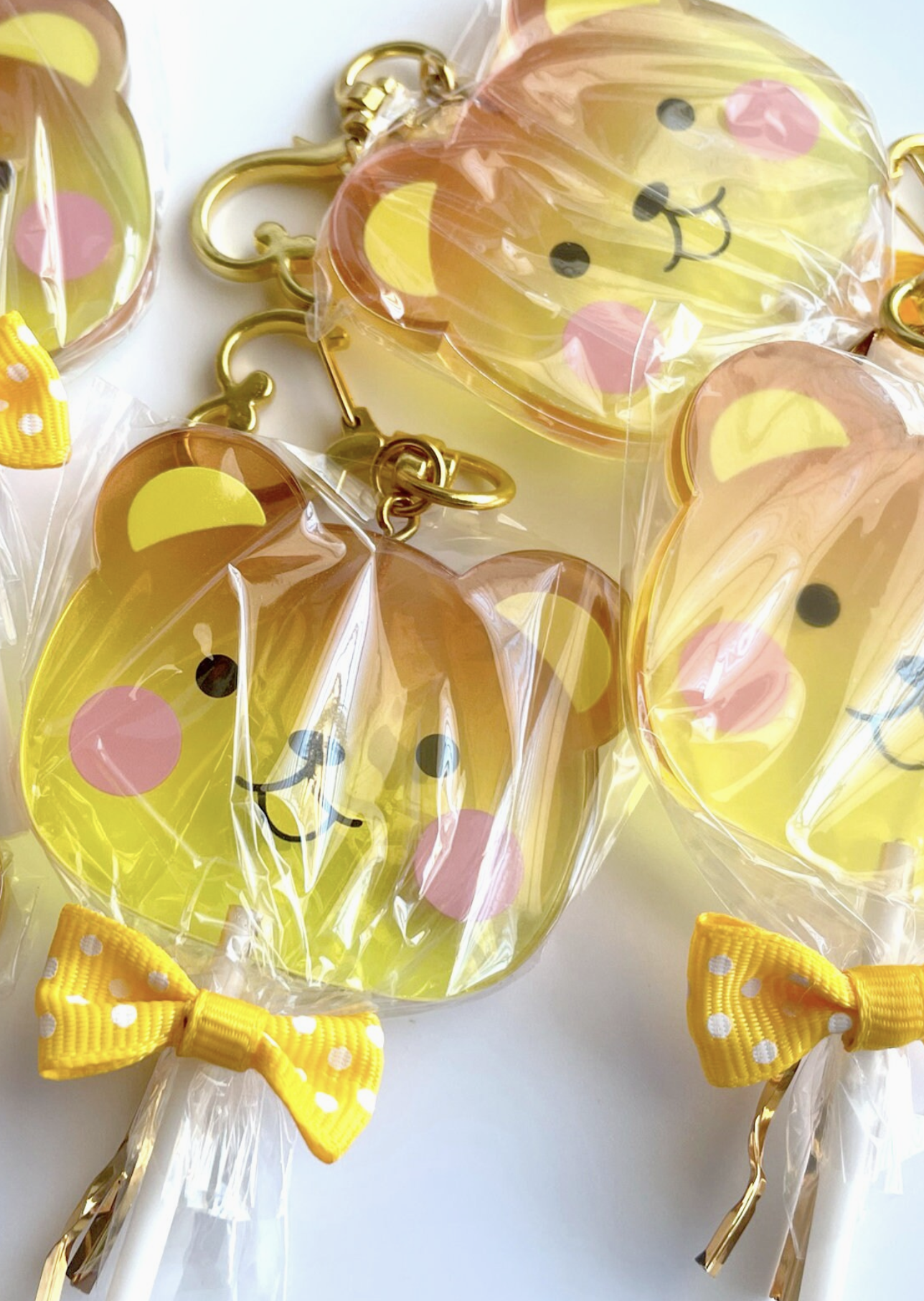 The Honey Bear Lollipop Style Keychain is perfectly sized to accompany you wherever you go. Attach this charming keychain to your keys, backpack, or purse. Kawaii, cute, brown bear