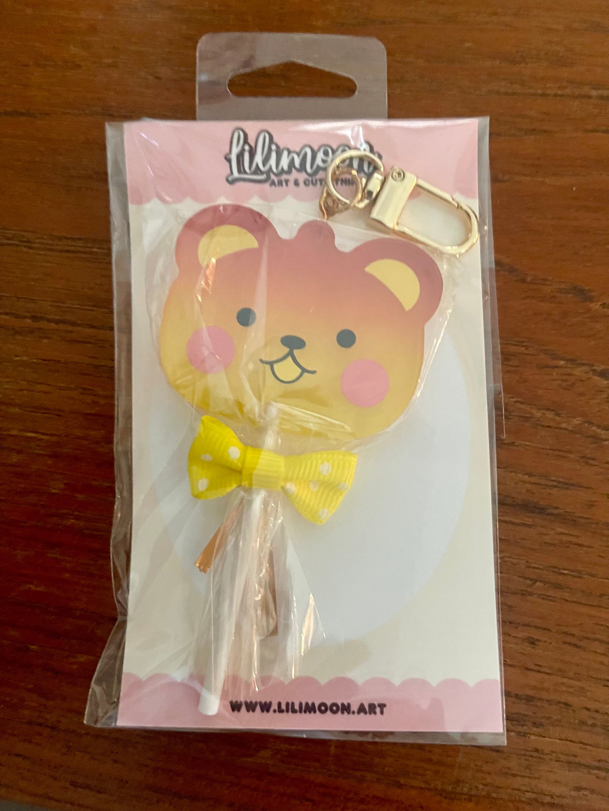 The Honey Bear Lollipop Style Keychain is perfectly sized to accompany you wherever you go. Attach this charming keychain to your keys, backpack, or purse , Kawaii brown bear