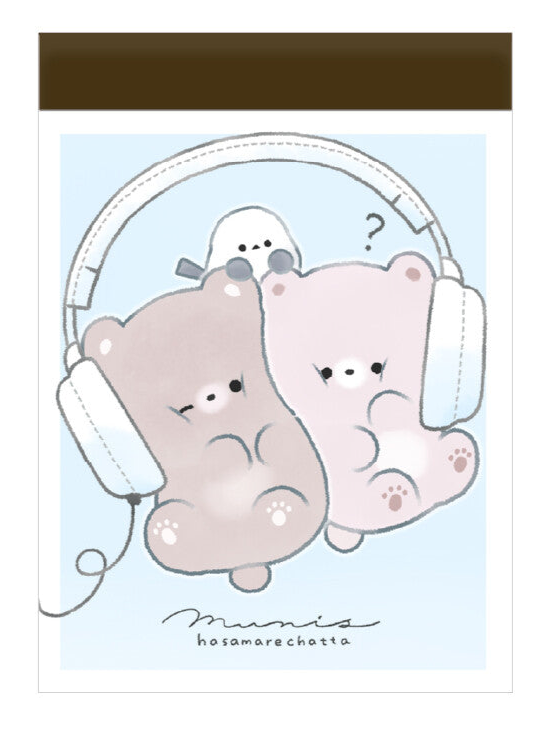 This charming kawaii notepad showcases buddies doing what buddies do-- sharing their favorite stuffs, especially music via headphones! This is a cute pick me up gift for yourself or another music afficionado. Everyone's needing to keep notes, grand or small, and why not color your day with a sweet design to do so?

This delightful piece will add a touch of musical fun to your stationery collection, making every note feel special.