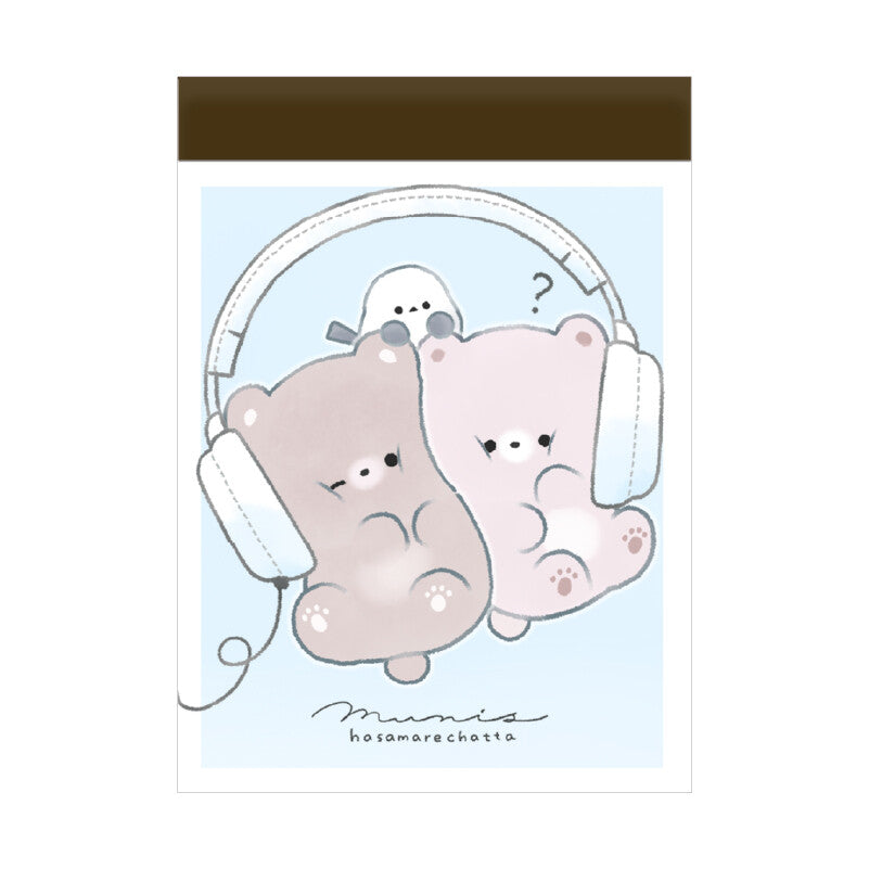 This charming kawaii notepad showcases buddies doing what buddies do-- sharing their favorite stuffs, especially music via headphones! This is a cute pick me up gift for yourself or another music afficionado. Everyone's needing to keep notes, grand or small, and why not color your day with a sweet design to do so?

This delightful piece will add a touch of musical fun to your stationery collection, making every note feel special.