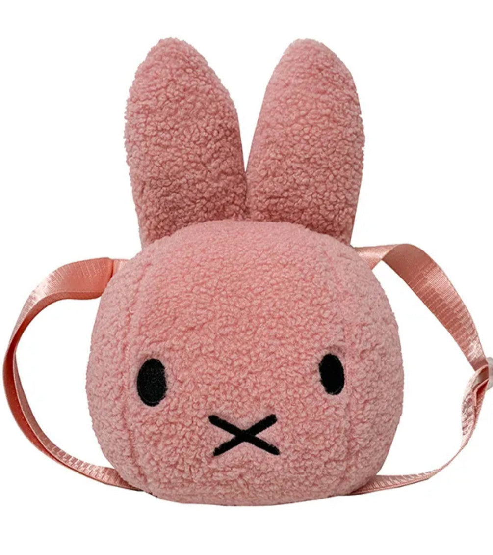 The infamous Miffy has become synonymous with cuteness and class. The Iconic Miffy Head Shoulder Bag features the well-known and beloved Miffy head, complete with her signature minimalist expression. This super sweet variation comes in a striking and unique pink tone.&nbsp;

Crafted from high-quality materials and providing a spacious interior for your daily essentials, this bag is also made with an adjustable shoulder strap for comfortable wear and versatile styling options. 