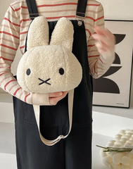 The infamous Miffy has become synonymous with cuteness and class. The Iconic Miffy Head Shoulder Bag features the well-known and beloved Miffy head, complete with her signature minimalist expression. Kawaii