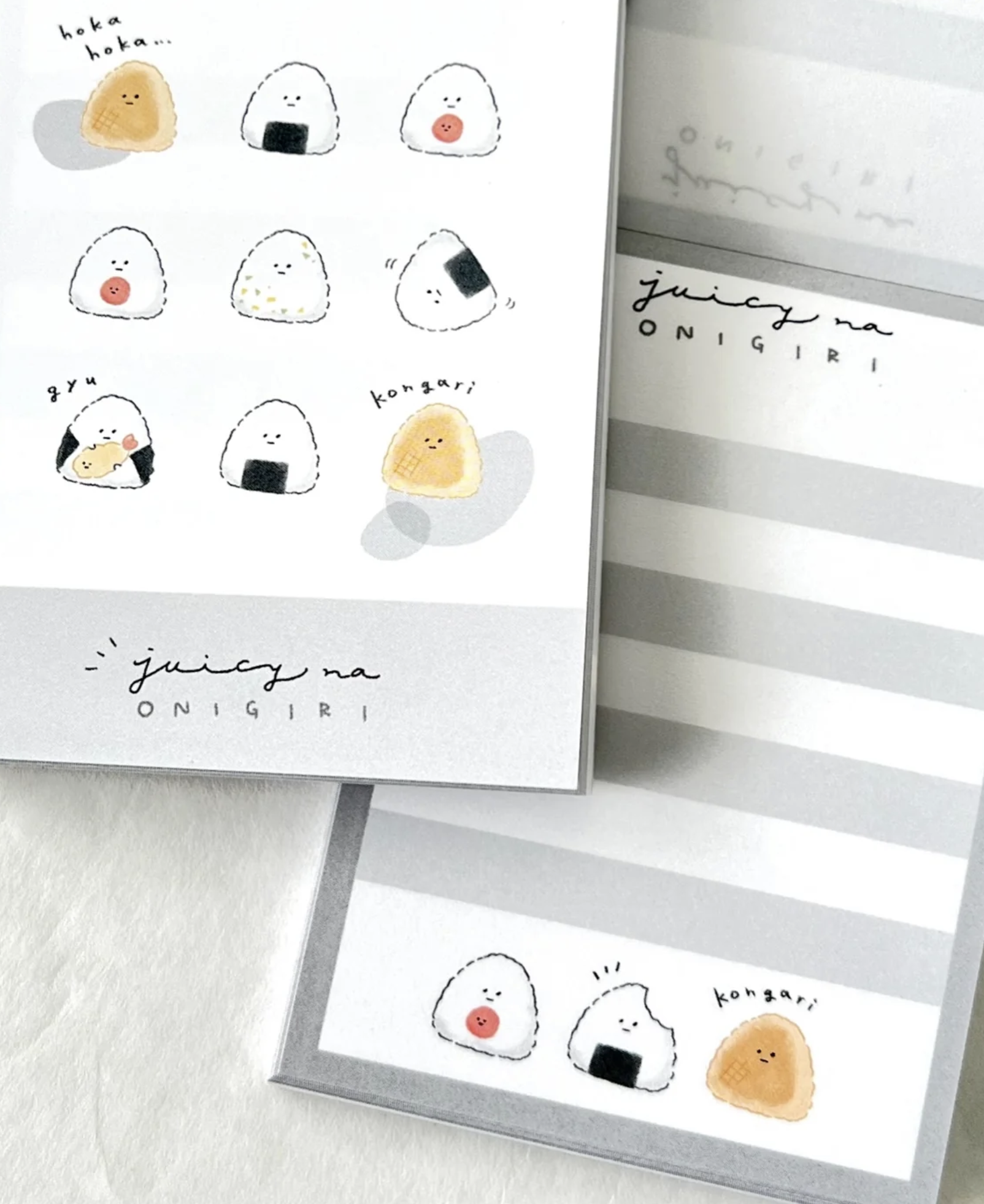 These Japanese Rice Balls 'Onigiri' Kawaii Mini Notepads feature two different designs, printed in full color. Quality binding, yet easy tear-out sheets.