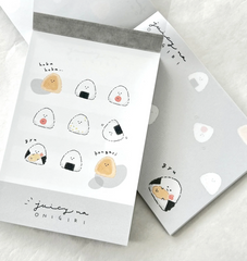 These Japanese Rice Balls 'Onigiri' Kawaii Mini Notepads feature two different designs, printed in full color. Quality binding, yet easy tear-out sheets.