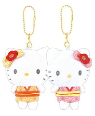 Carry a touch of tradition and sweetness wherever you go with the Jinbei Style Romper Hello Kitty &amp; Twin Mimi Magnetic Keychain Set! A must-have for celebrating the beauty of Japanese warmer days. This delightful duo showcases Sanrio's Hello Kitty and her twin sister, Mimi, dressed in brightly colored traditional jinbei- a lightweight breathable clothing made for babies and toddlers in Japan. This keychains brings a mix of cultural elegance and playful design to your everyday essentials.
