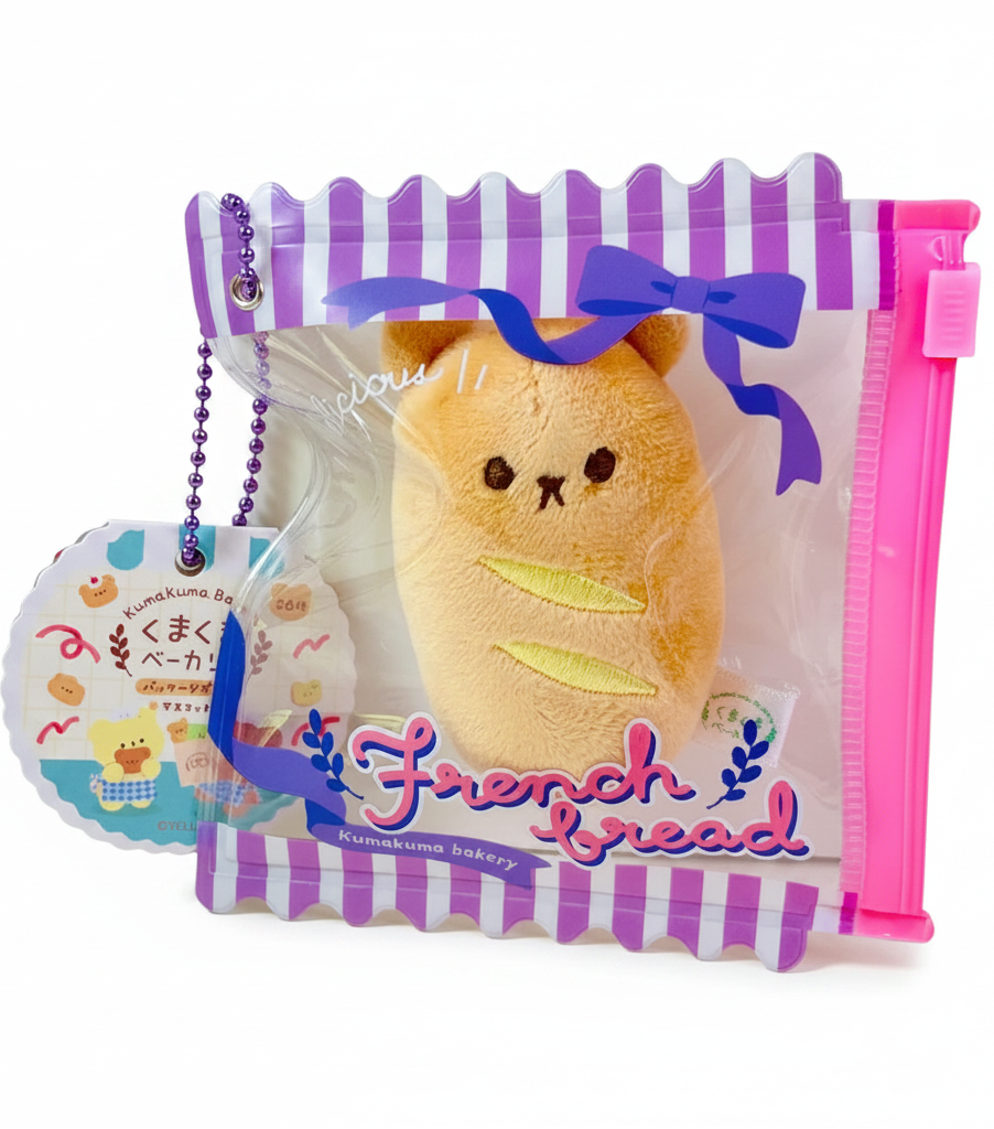 Say hello to the cutest little snack to carry your essentials! This unique Kuma Bakery Bear in a Bag Keychain French Baguette features a soft, squishy bear bread plushie tucked inside a charming purple-and-white striped mini wallet. The softness is like a mochi dessert and design is unmatched.