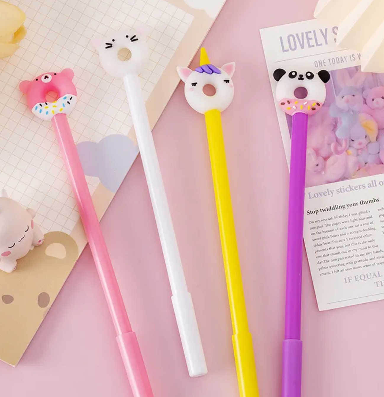 Our Kawaii Donut Animals Gel Pen Set includes four pens in various happy color palettes of white, purples, pinks, and yellow. These pens provide a smooth writing experience for those who like a gel ink tip.